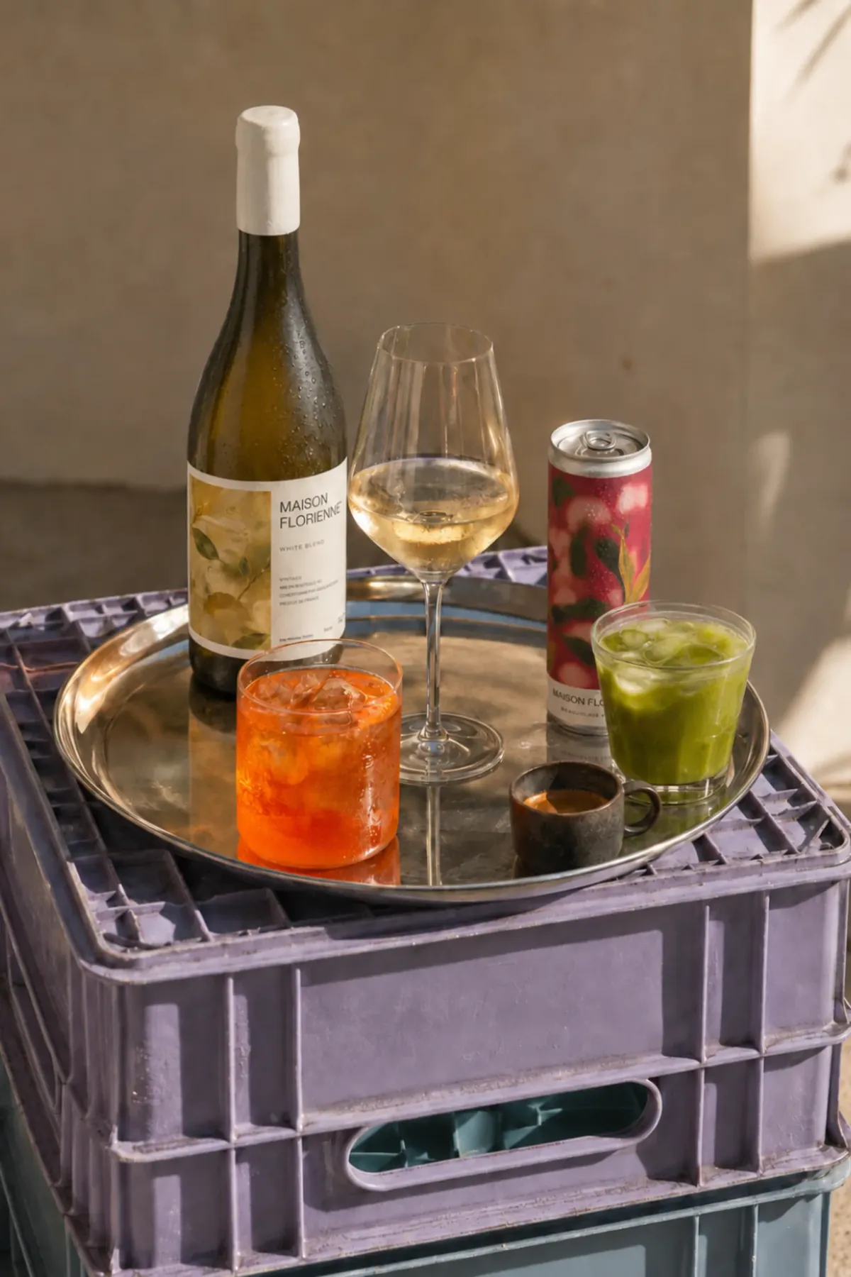 A tray bringing wine, a canned drink, coffee and matcha into the same beverage occasion